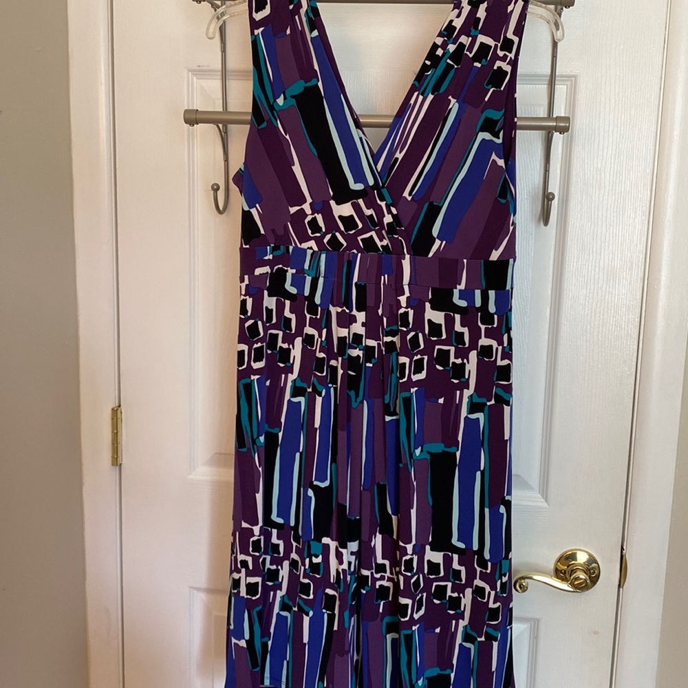 Geometric sleeveless faux wrap dress